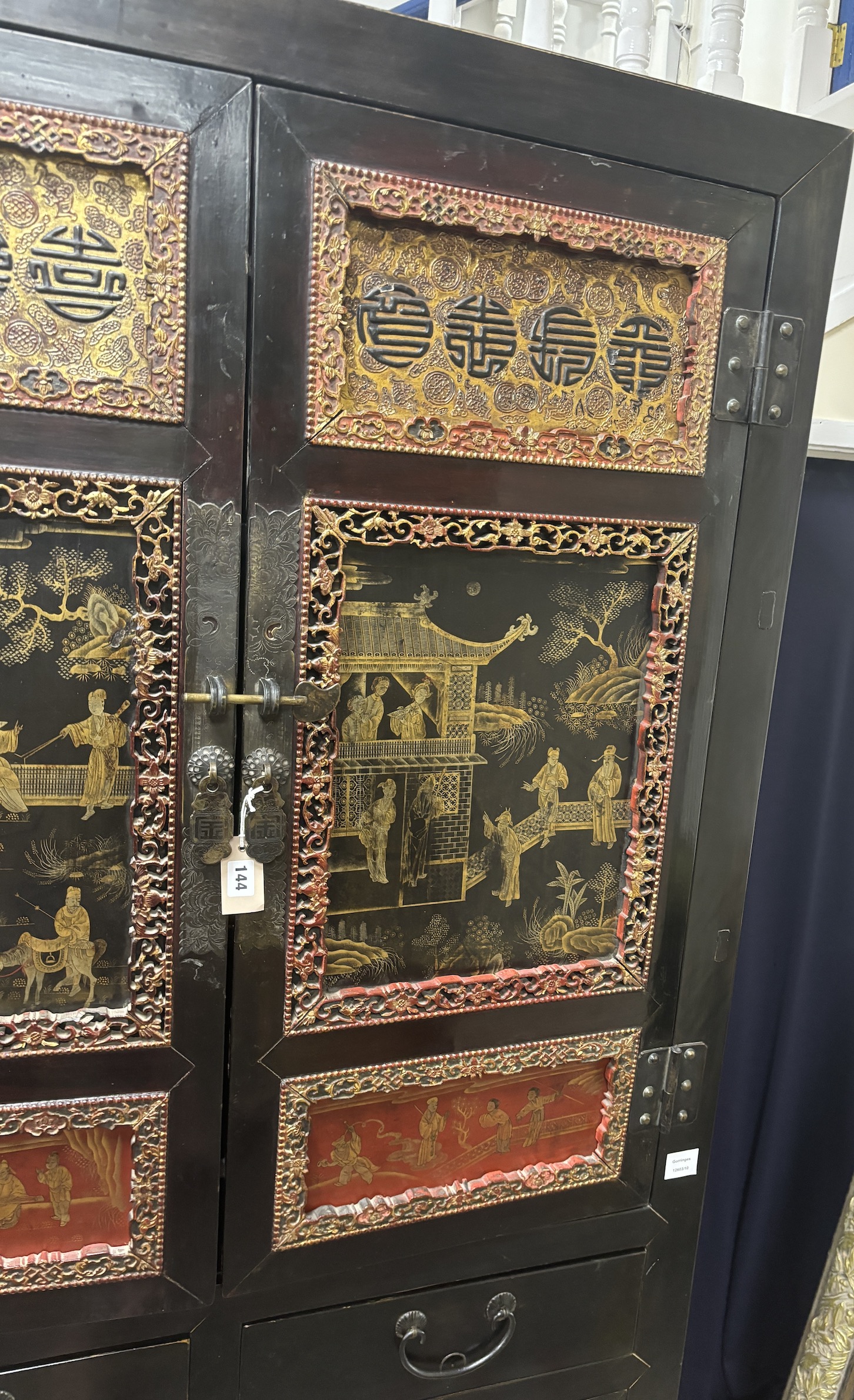 A Chinese lacquered side cabinet, width 109cm, depth 50cm, height 203cm